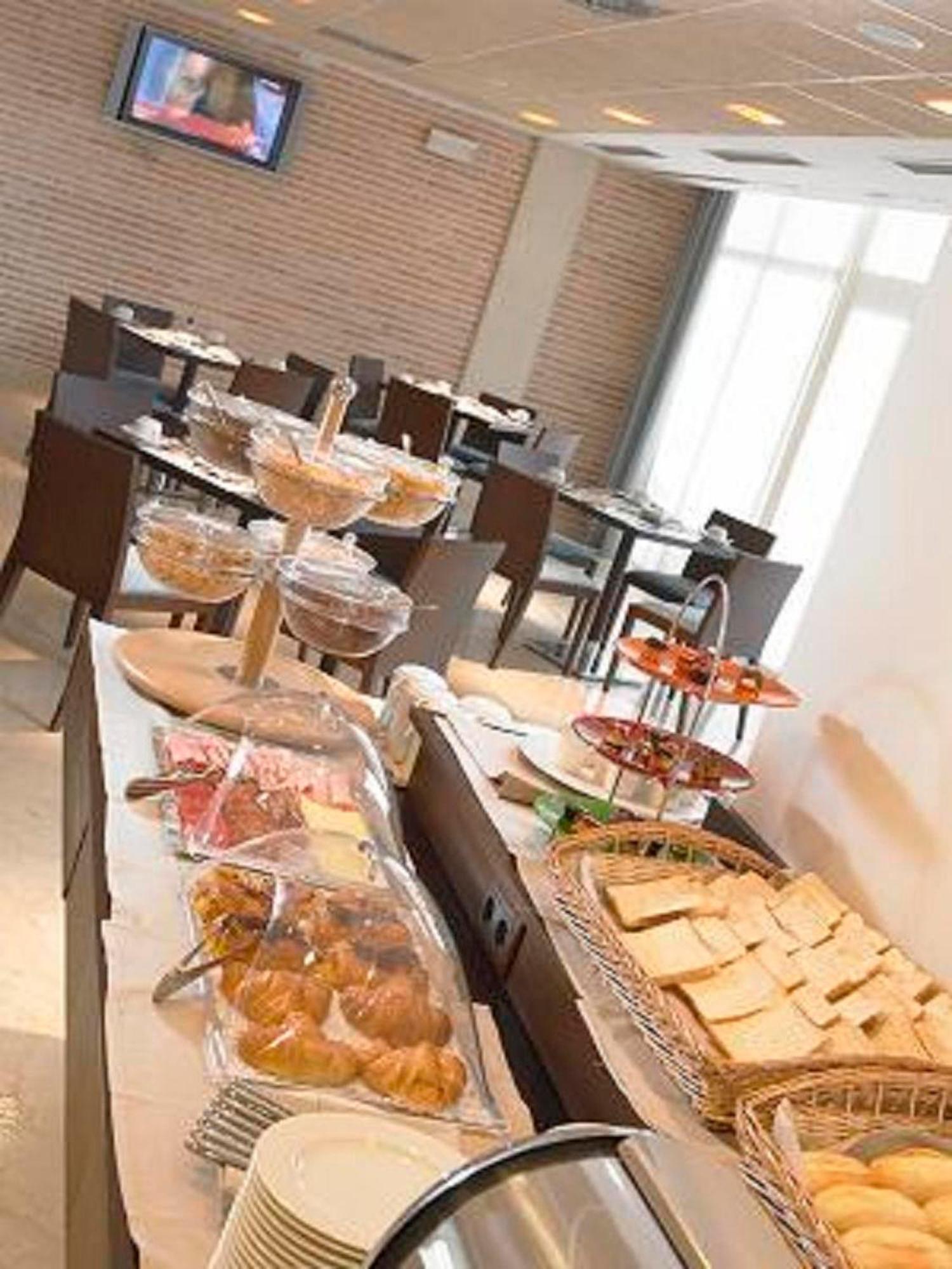 Hotel Isla De La Garena Alcalá de Henares Étterem fotó